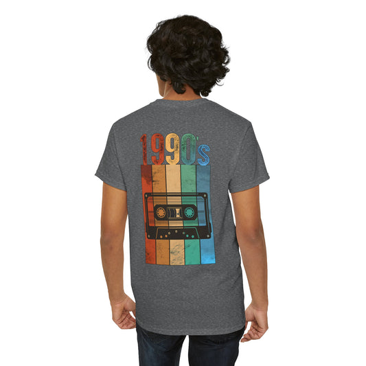 Person wearing a gray t-shirt with a colorful '1990s' design on the back.