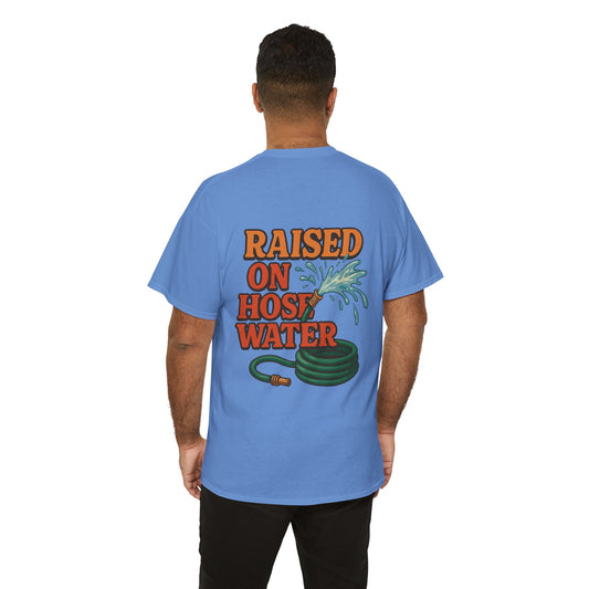Person wearing a blue t-shirt with 'Raised on Hose Water' text and graphic on the back.