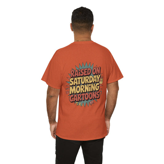 Person wearing an orange t-shirt with 'Raised on Saturday Morning Cartoons' text on the back.