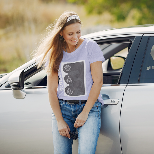 Woman standing next to a car in an outdoor setting