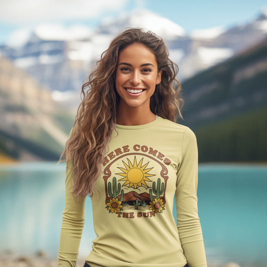 Women in mountains wearing a yellow shirt