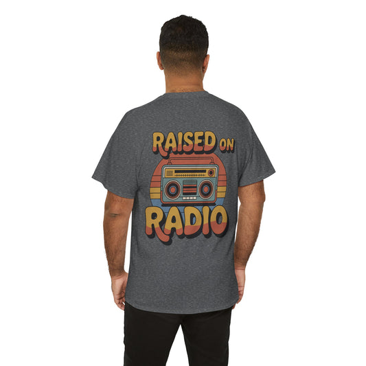 Person wearing a gray t-shirt with 'Raised on Radio' graphic on the back