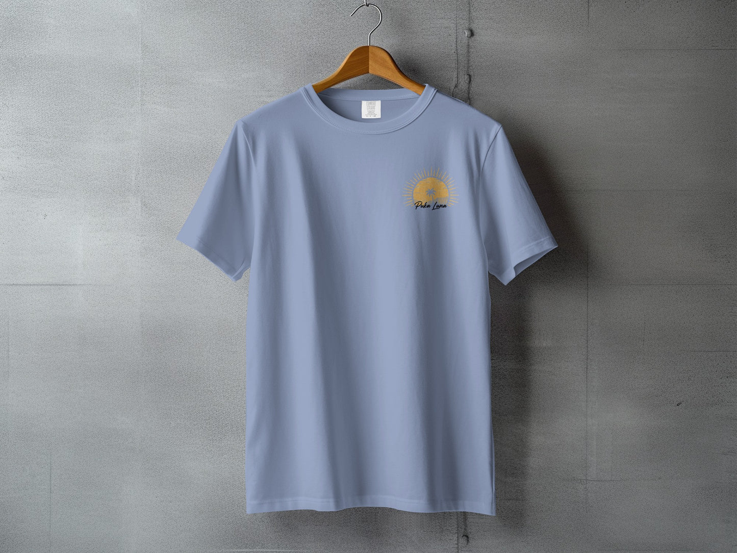 Light blue t-shirt with a sun logo and "Poke Lava" text.