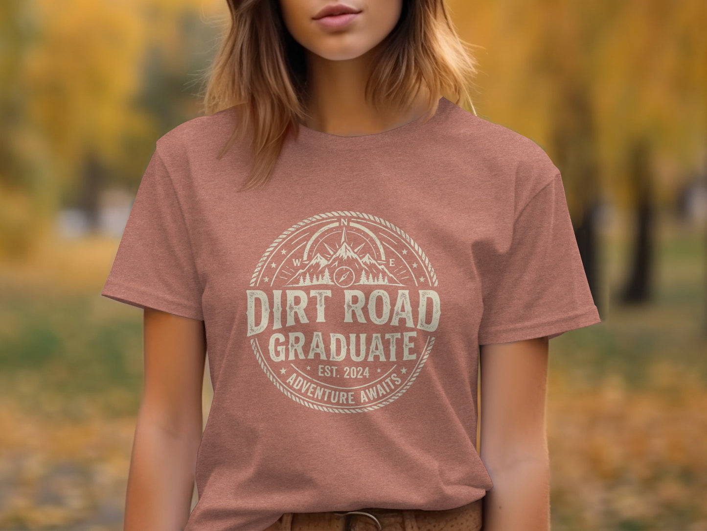 Dirt Road Graduate '24 Adventure | Vintage Outdoor Apparel: T-shirt with "Dirt Road Graduate" and compass design.