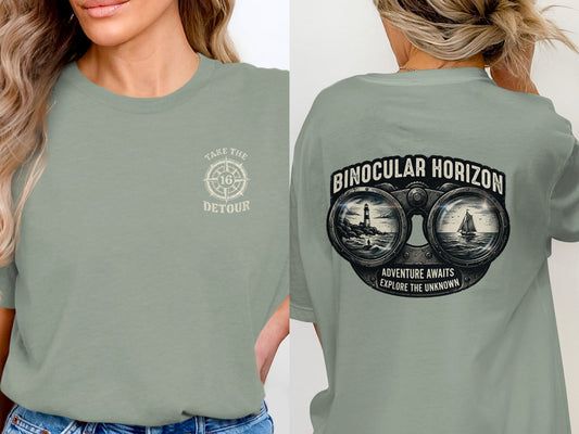 Green t-shirt with "Binocular Horizon" design featuring binoculars overlooking a boat and ocean.