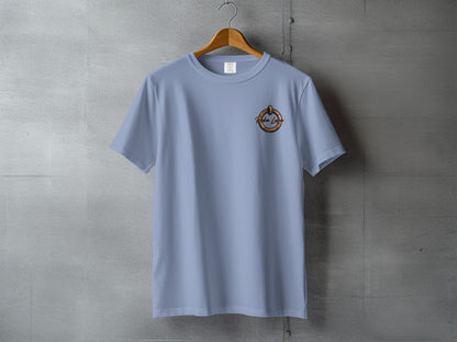 Light blue t-shirt with "Rotha Love" logo on chest, hanging on a hanger.
