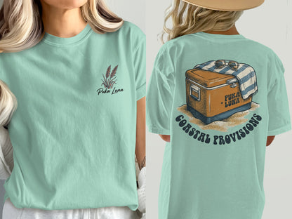 Mint green t-shirt with "Puka Luna" and wheat graphic on front, cooler graphic on back.