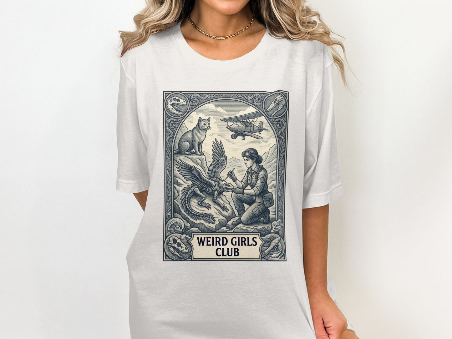 Woman with dragon and cat, vintage airplane above, "WEIRD GIRLS CLUB" text.