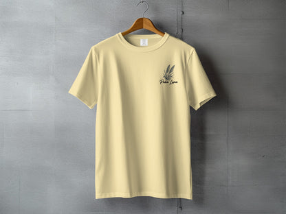 Pale yellow t-shirt with "Perla Luna" text and a sprig graphic.