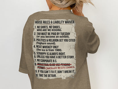 T-shirt with "House Rules & Liability Waiver" and ten numbered rules in black text.