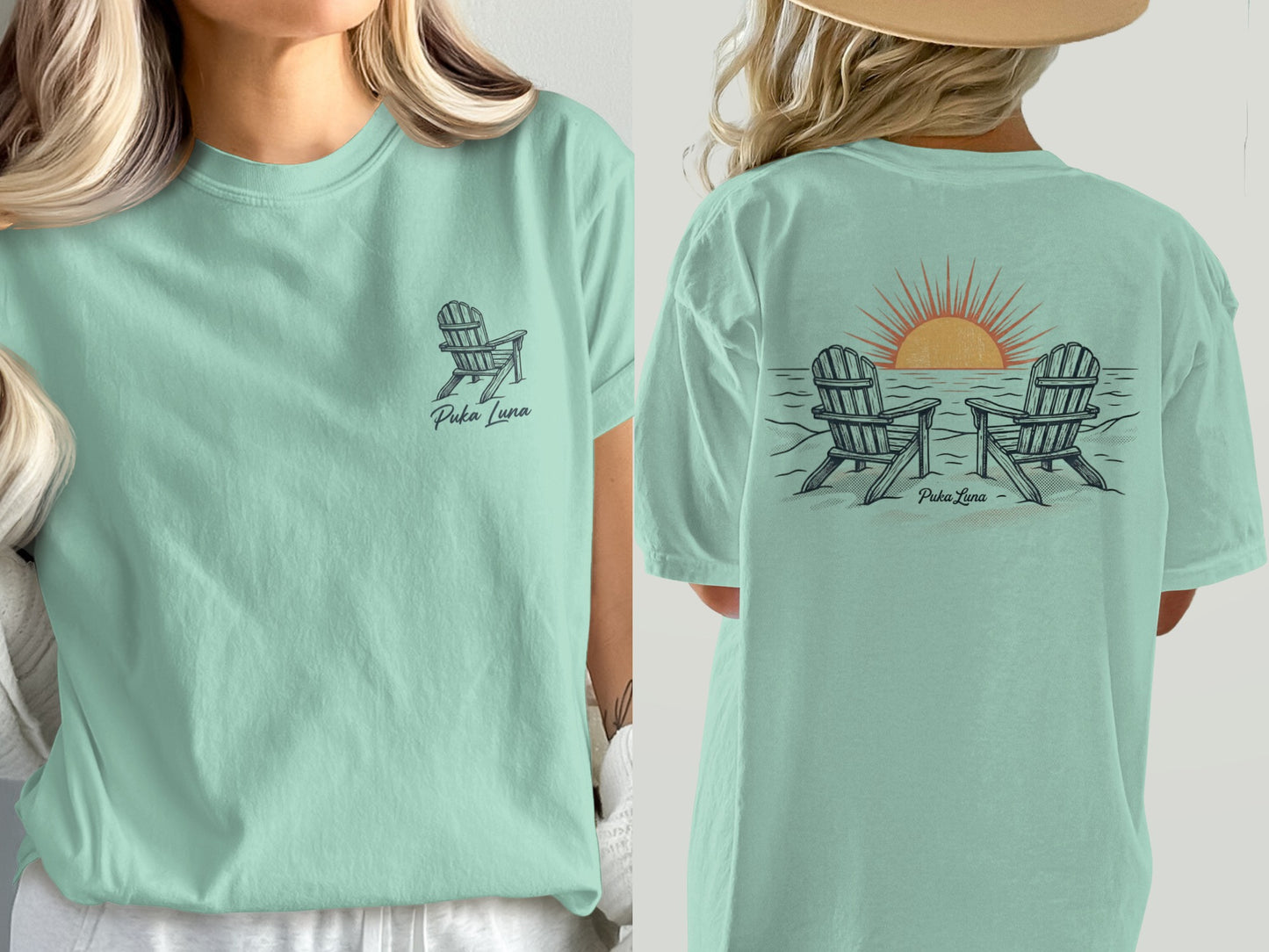 Light teal t-shirt with two Adirondack chairs and sunset graphic on back.