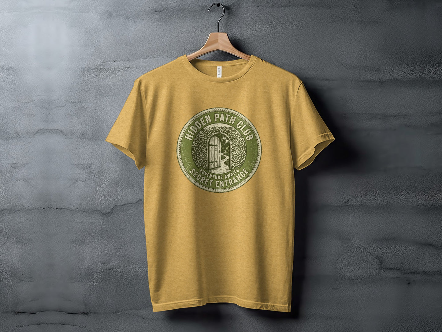 Hidden Path Club: Secret Entrance | Vintage Outdoor Apparel: Yellow t-shirt with circular "Hidden Path Club" logo featuring a stone archway.