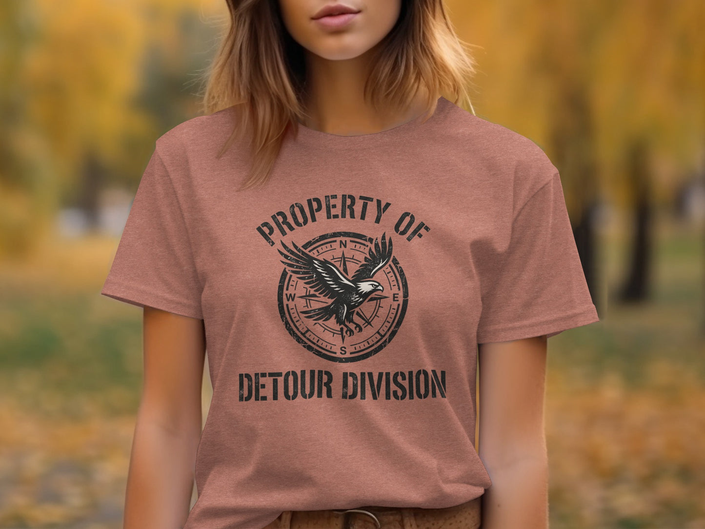 Rugged Detour Division Compass Eagle Tee Wilderness Shirt: Brown t-shirt with a compass and eagle graphic; text reads "Property of Detour Division."