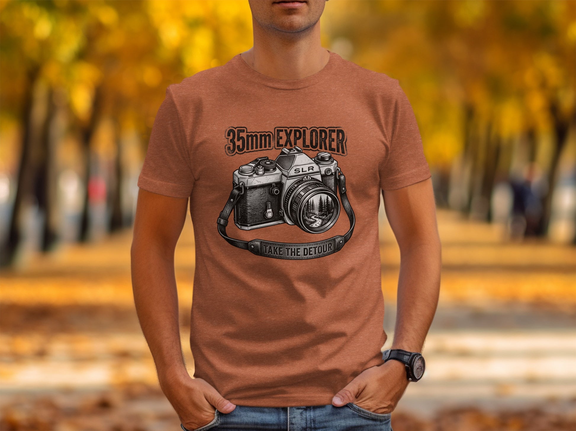 35mm Explorer Detour | Vintage Outdoor Apparel: Brown t-shirt with graphic of vintage camera, "35mm EXPLORER", "SLR", and "TAKE THE DETOUR".