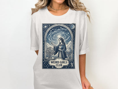 Woman in celestial graphic t-shirt with "Weird Girls Club" text.