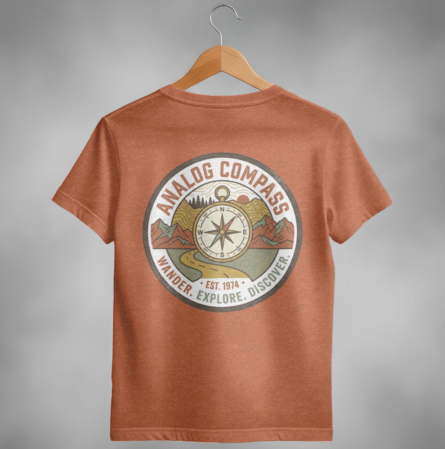 T-shirt back with round vintage compass and "Analog Compass" logo.