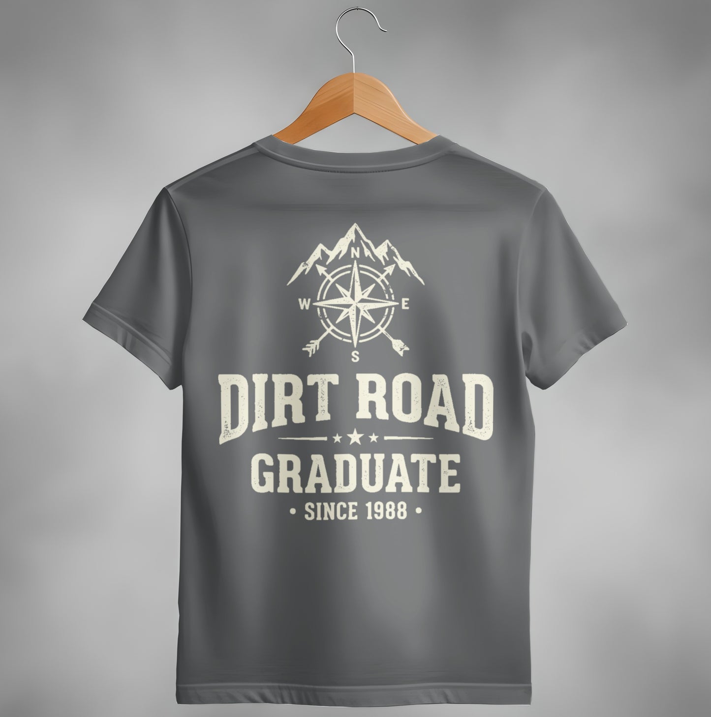 Gray t-shirt with "Dirt Road Graduate" and compass graphic.