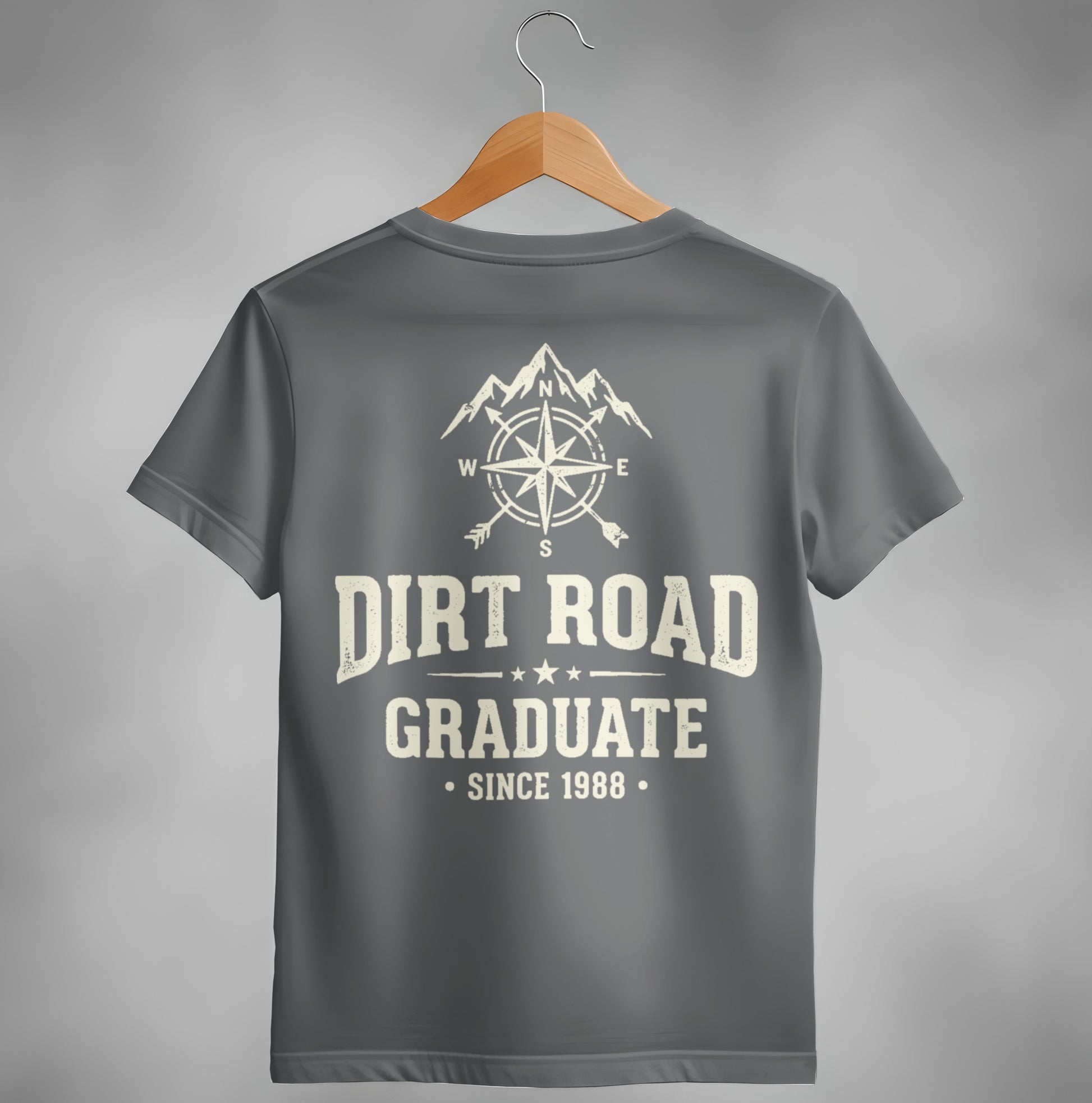 Gray t-shirt with "Dirt Road Graduate" and compass graphic.