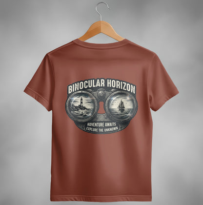 T-shirt with binoculars graphic featuring a lighthouse and sailboat, text "Binocular Horizon" and "Adventure awaits explore the unknown."