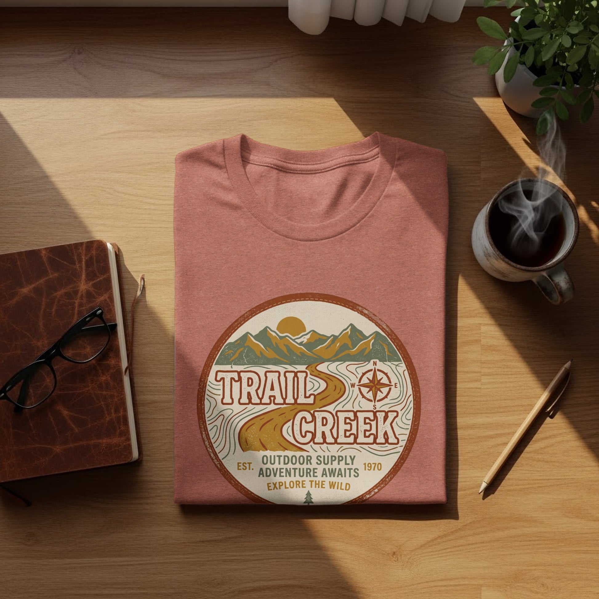Heritage Heritage Explorer Trail Creek Nomad Tee: Trail Creek t-shirt with outdoor scene and compass logo.