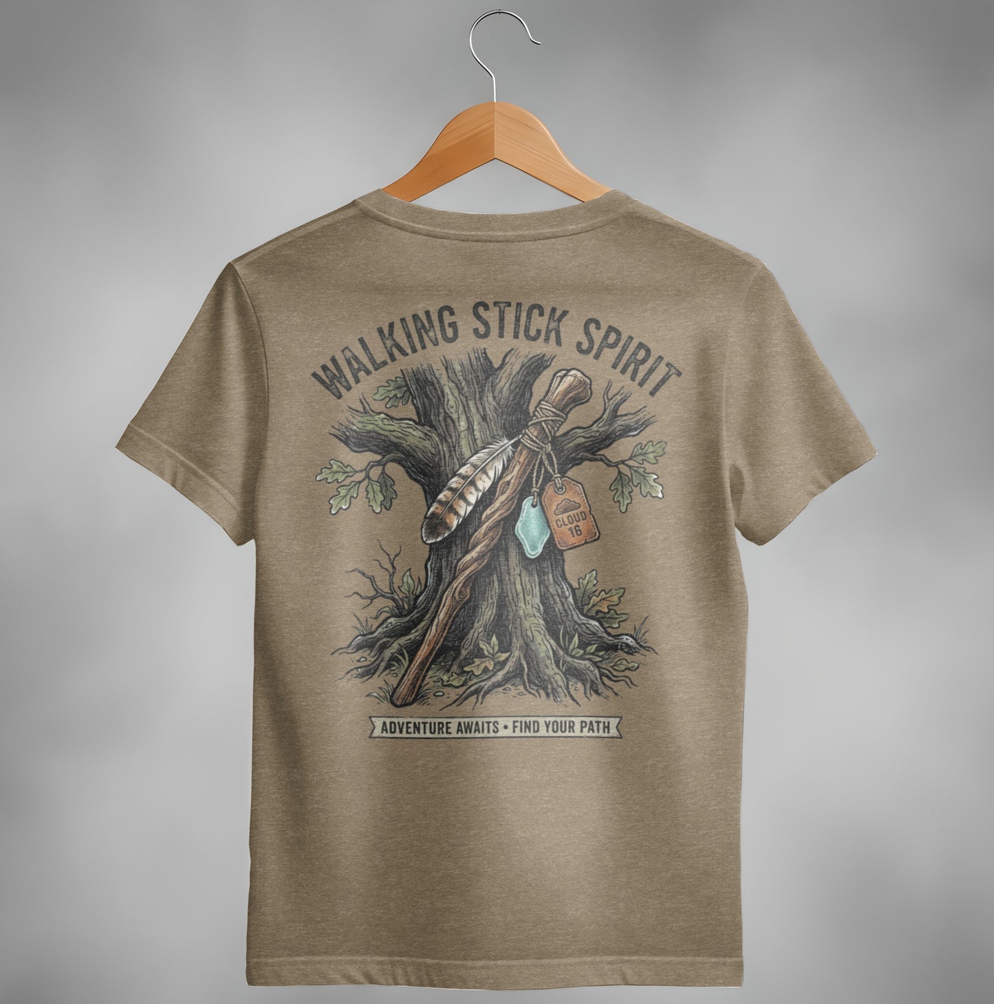Walking Stick Spirit shirt with tree, feather, and compass illustration.