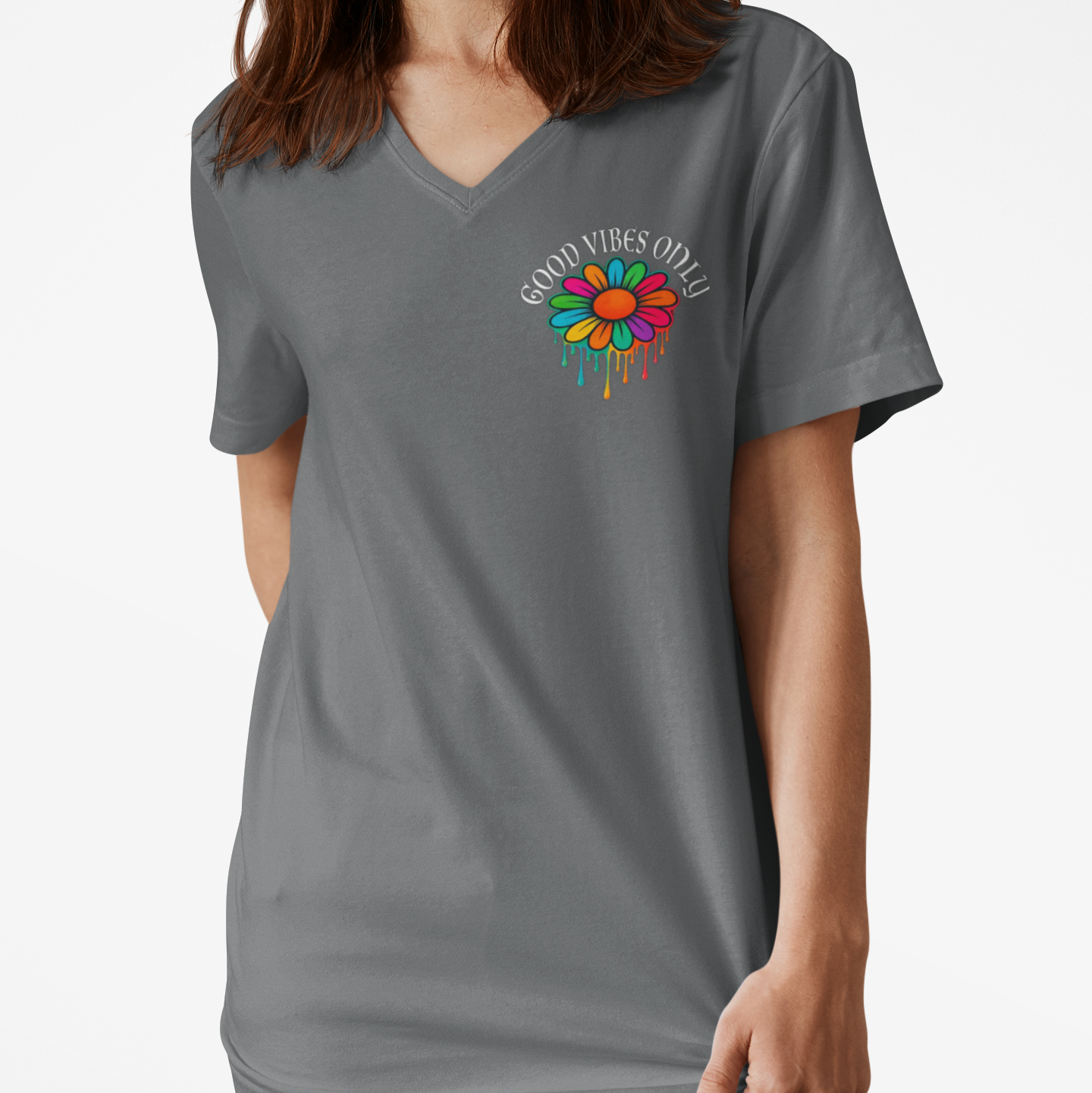 Person wearing a gray t-shirt with a colorful flower design and text on a white background