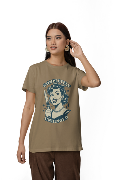 Woman wearing a beige t-shirt with graphic design and text on a white background