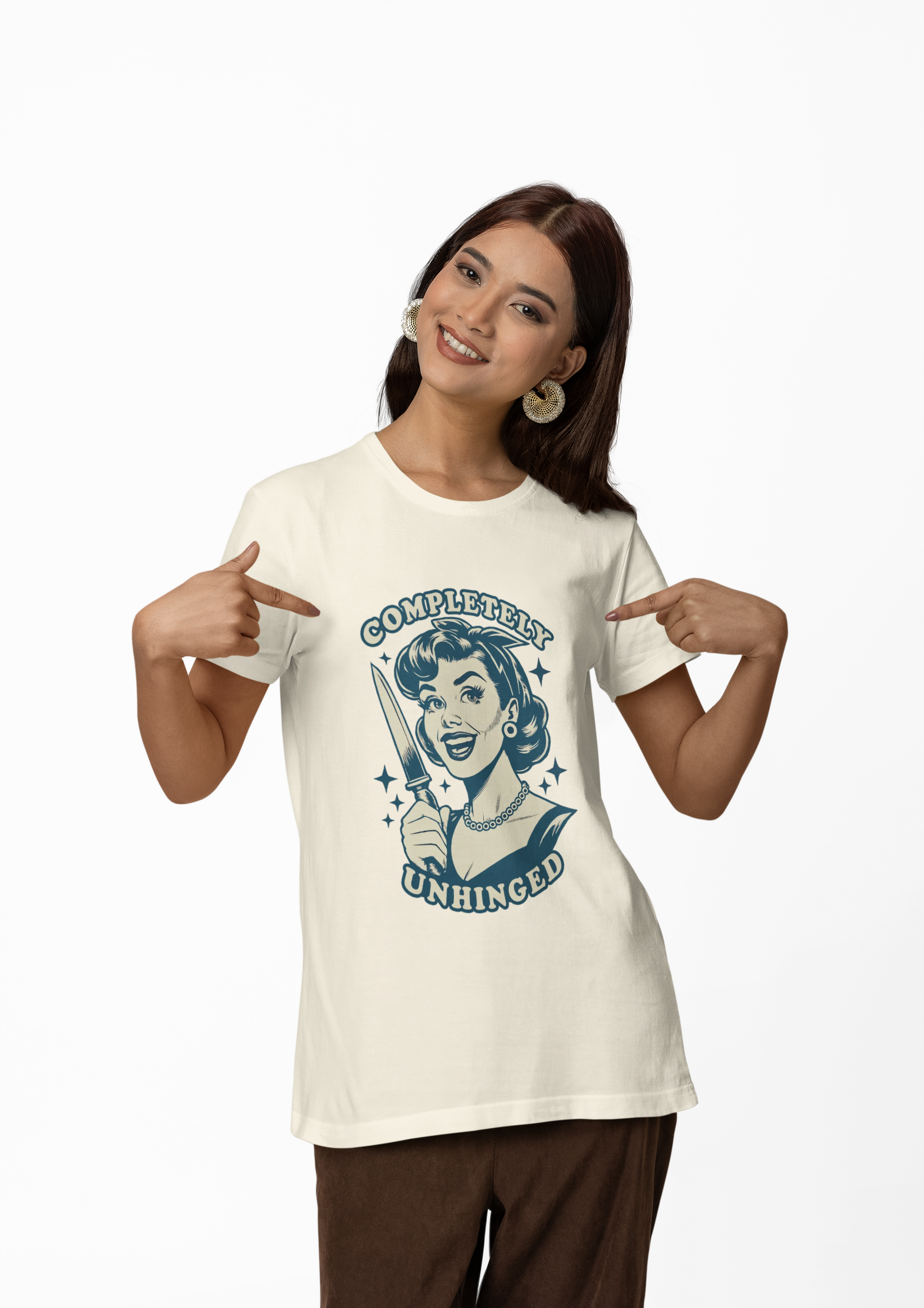 Woman wearing a t-shirt with a graphic design pointing to herself.