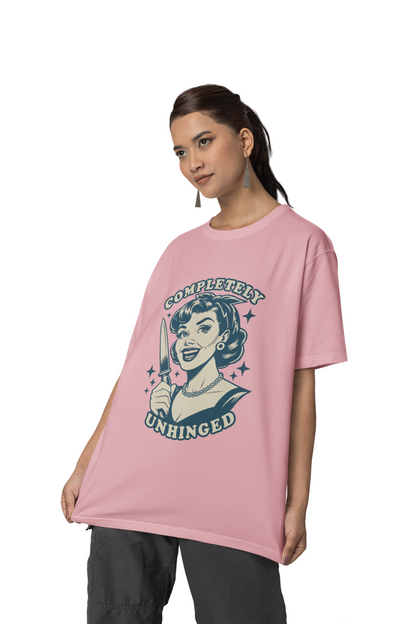 Woman wearing a pink t-shirt with graphic design and text on a white background