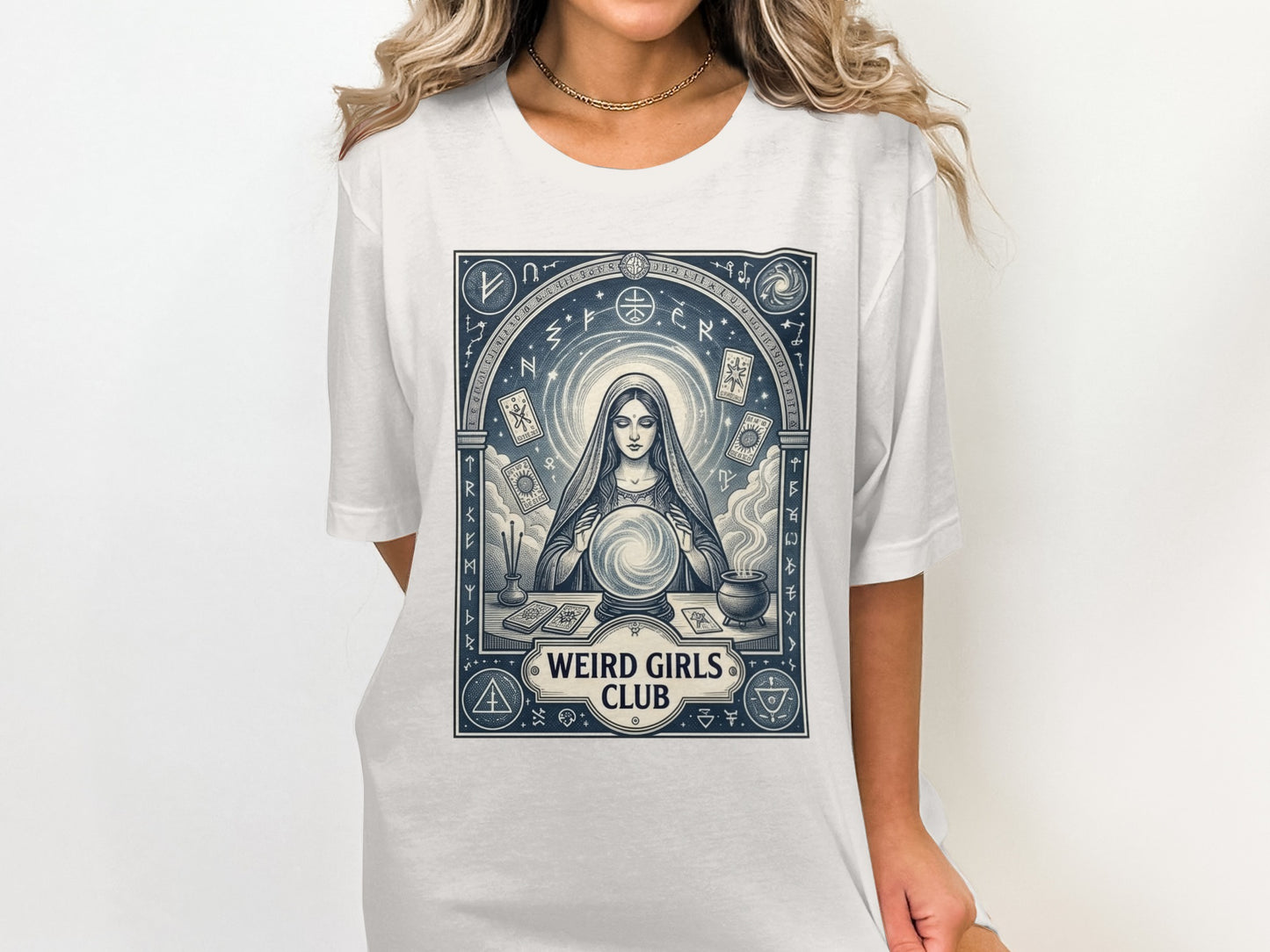 T-shirt with occult graphic of a woman with a crystal ball and astrological symbols.