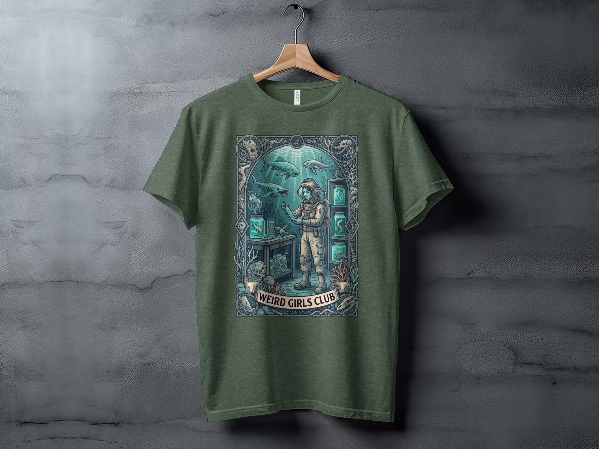 Green t-shirt with "Weird Girls Club" text and a detailed underwater scene.