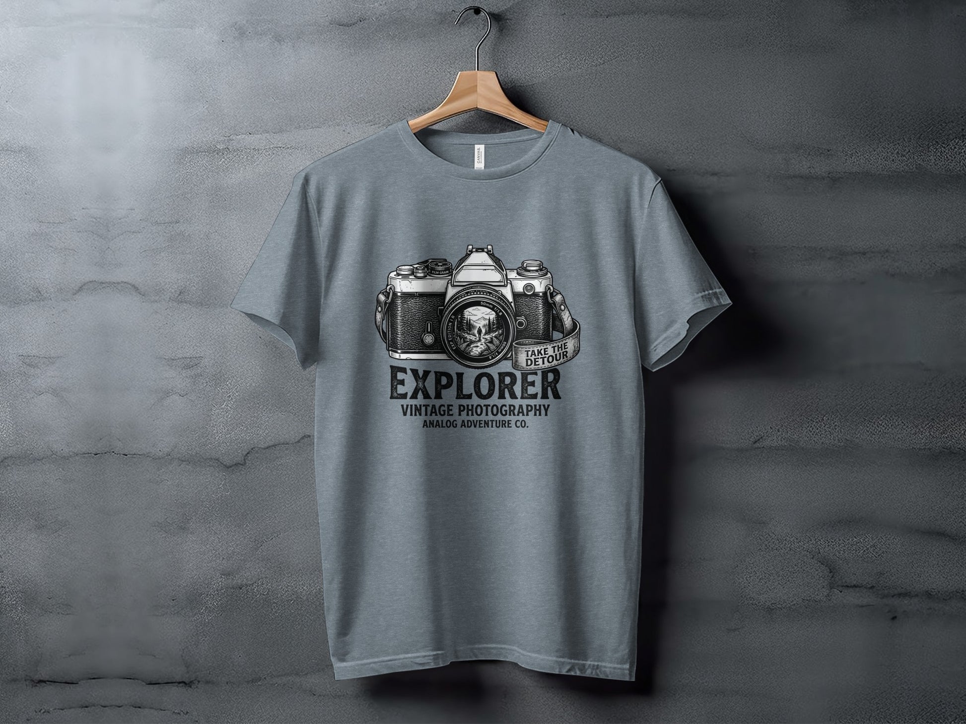 The Analog Explorer's Detour: Backcountry Outpost Shirt: Grey t-shirt with vintage camera and "Explorer Vintage Photography" graphic.