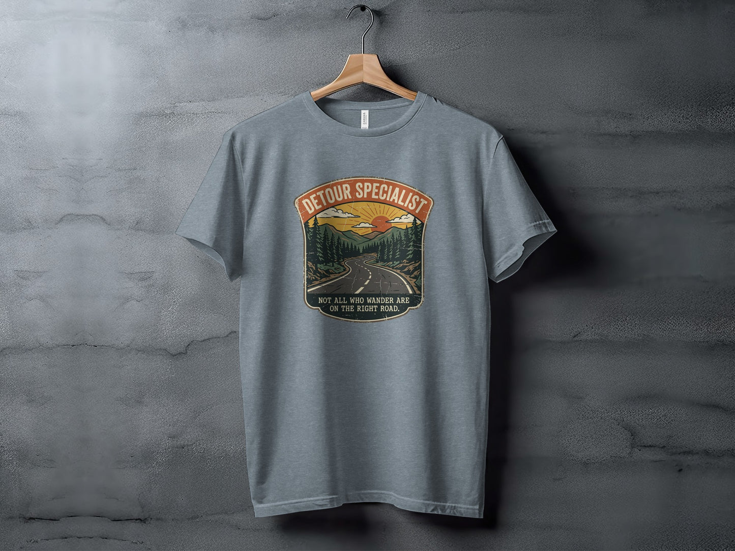 Heritage Detour Specialist Vintage Graphic Nomad Tee: Gray t-shirt with "Detour Specialist" and mountain road graphic.