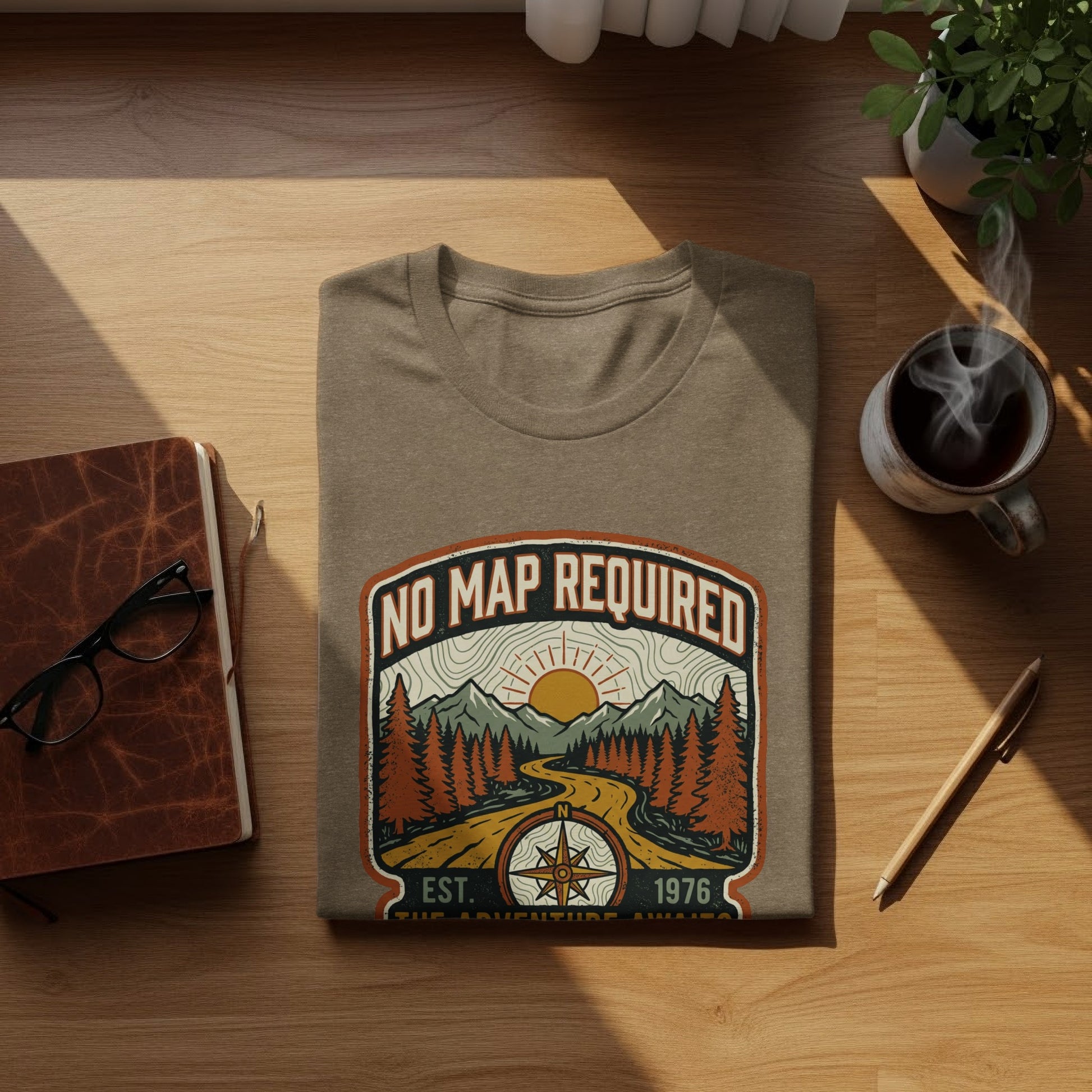 Heritage No Map Required: The Adventure Awaits Nomad Tee: T-shirt with "No Map Required" text and mountain landscape design.