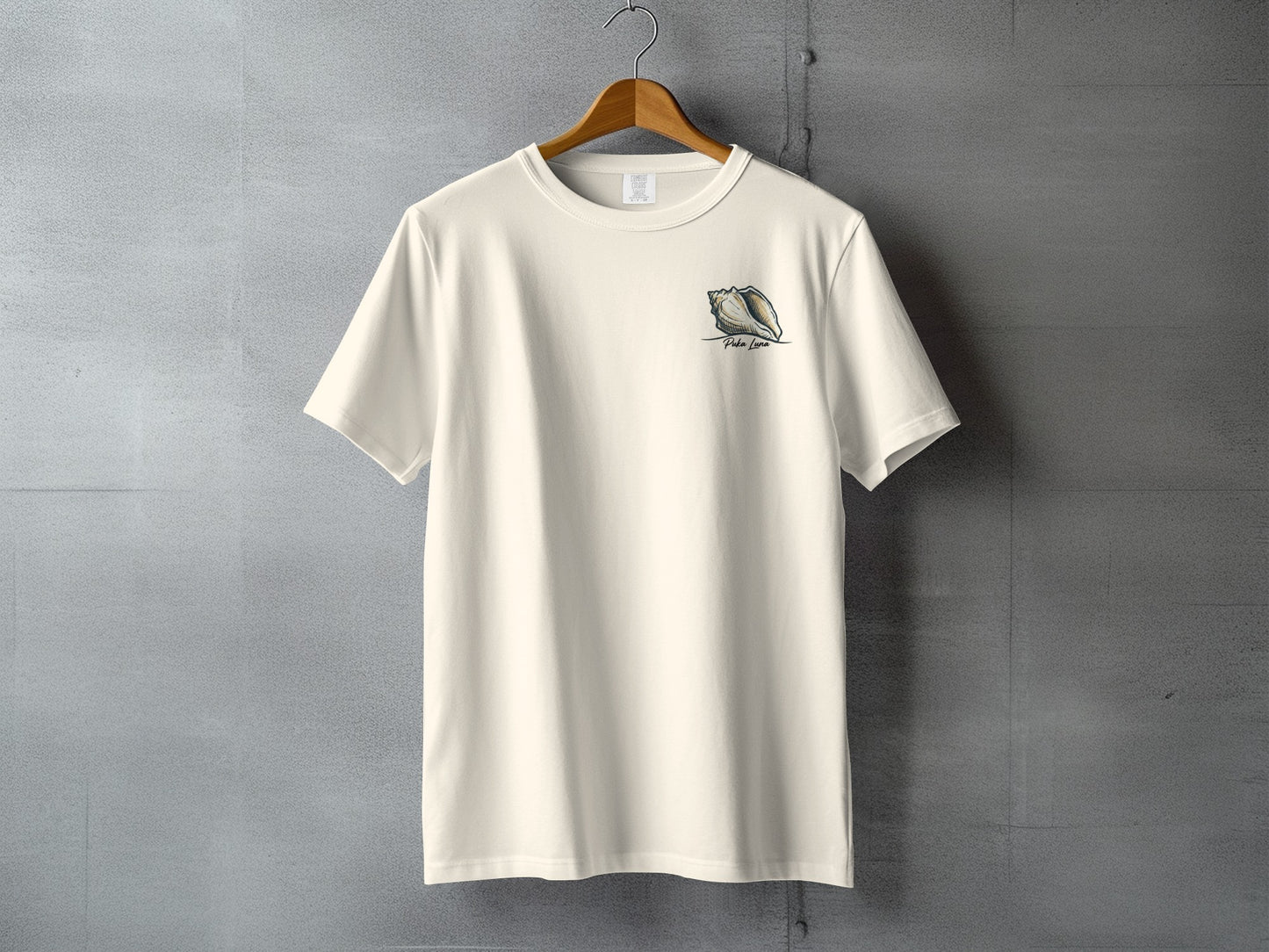 Cream t-shirt with a seashell graphic and "Peace Love" text on the left chest.