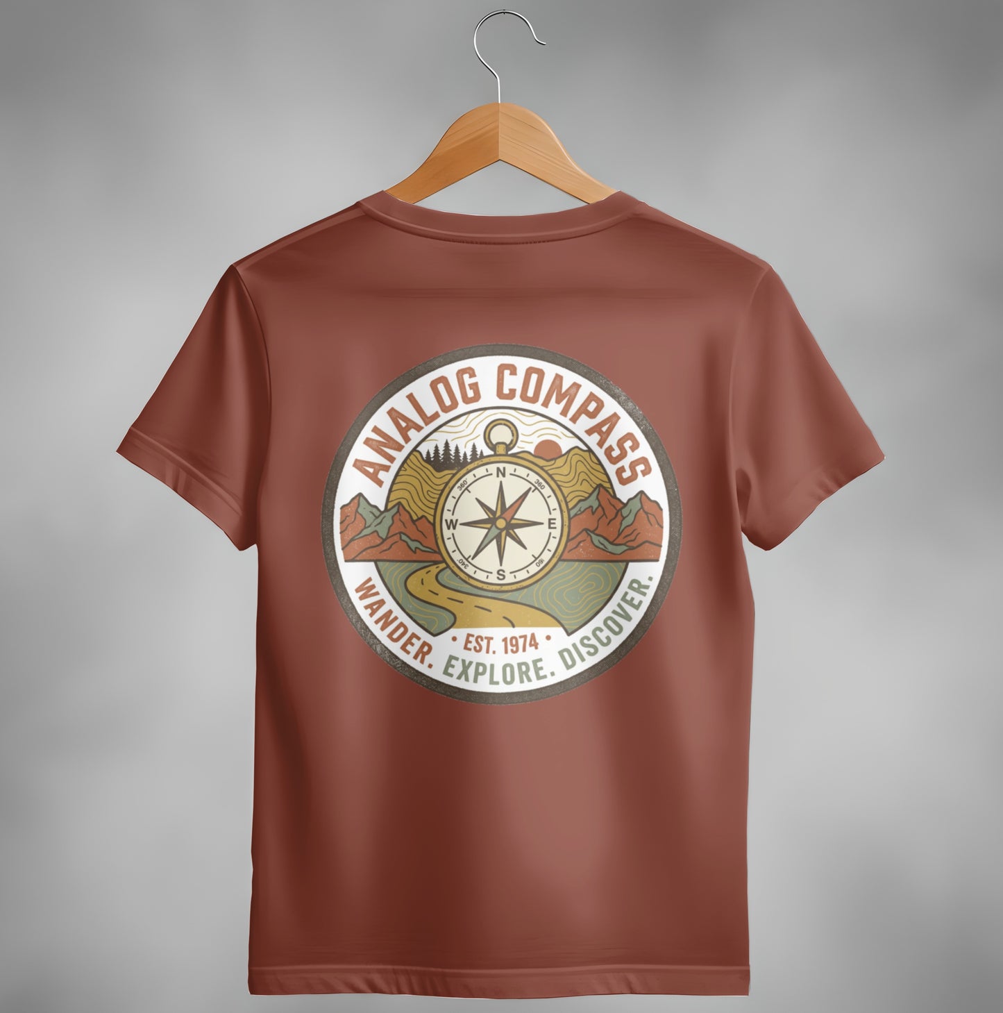 Brown t-shirt with "Analog Compass" logo and compass rose.