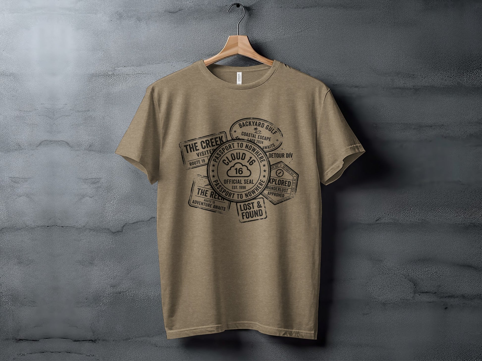 Rugged Wanderlust Passport Stamp Graphic Wilderness Shirt: T-shirt with passport-style stamps for "Cloud 16" and "The Creek".