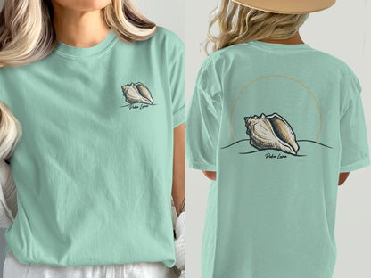 Mint green t-shirt with seashell graphic and "Puka Luna" text.