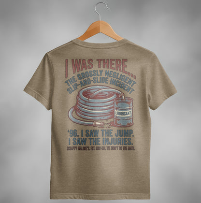 T-shirt with "I WAS THERE THE GROSSLY NEGLIGENT SLIP-AND-SLIDE INCIDENT" text.
