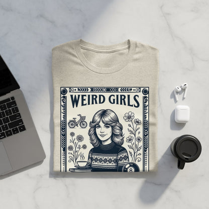 T-shirt with "WEIRD GIRLS" text and illustration of a woman with flowers and a billiard ball.