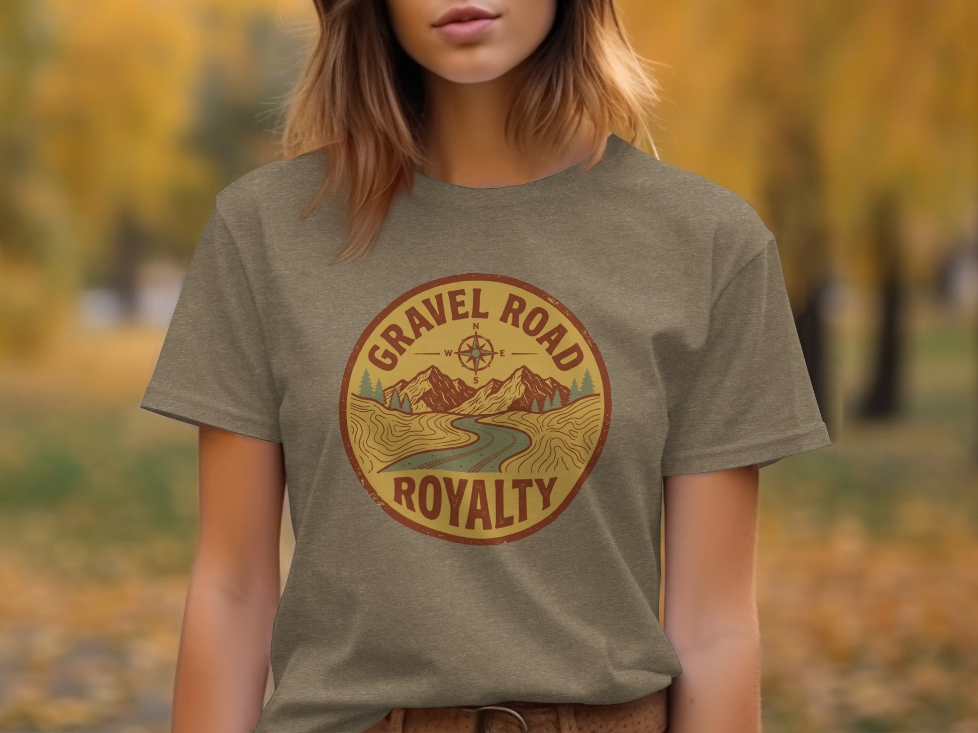Gravel Road Royalty Adventure Tee | Vintage Outdoor Apparel: Gravel Road Royalty circular logo with mountains, river, and compass.
