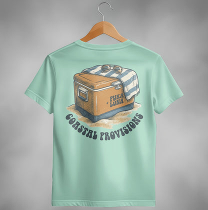 Cooler with towel and sunglasses on sand, "Puka Luna Coastal Provisions" text.