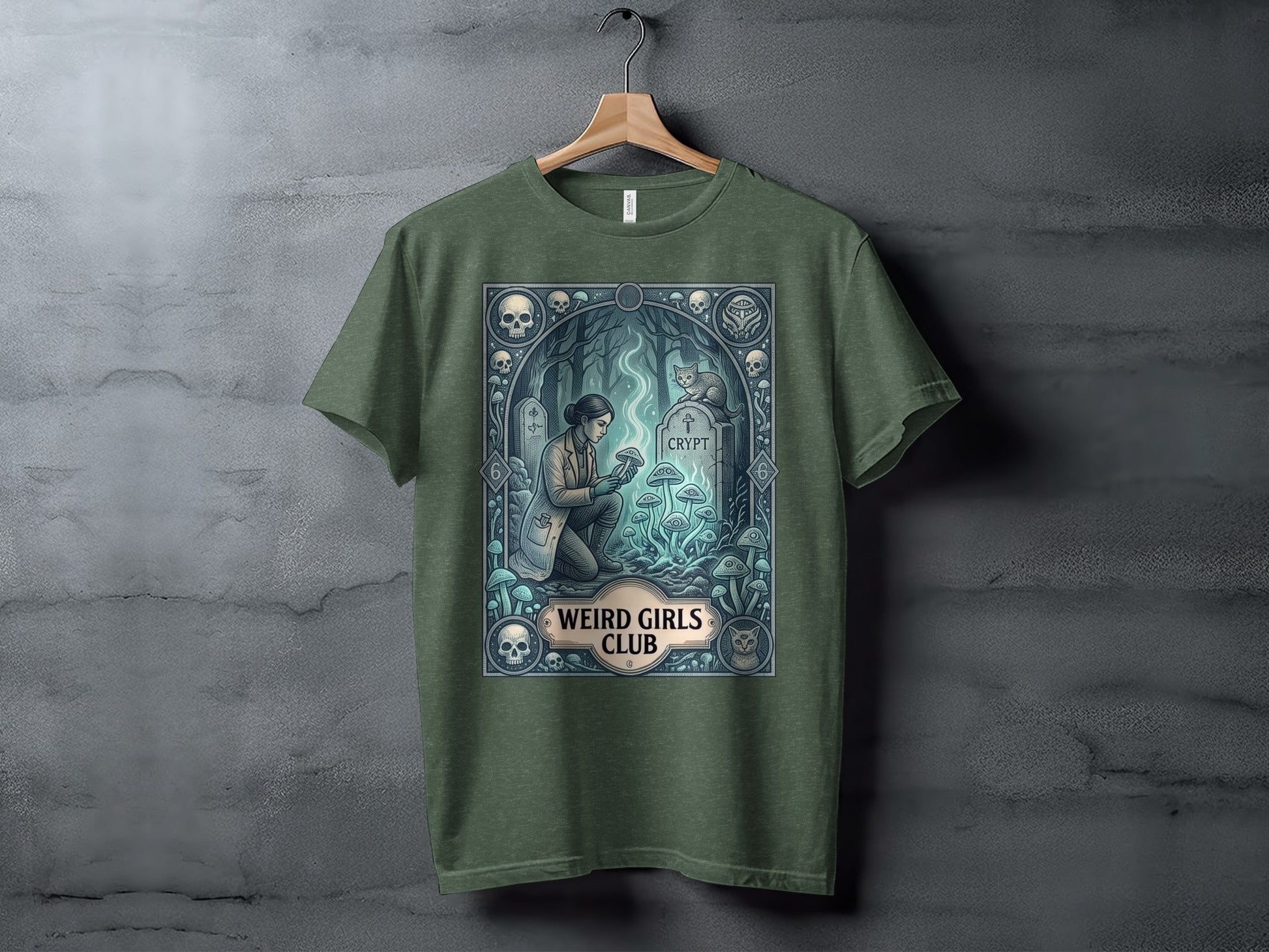 Green t-shirt with "Weird Girls Club" crypt and mushroom design.