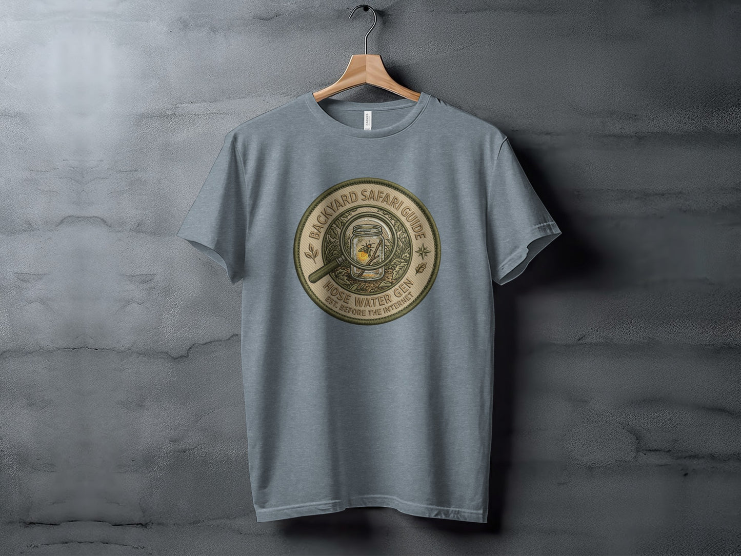 Backyard Safari Guide Explorer: Backcountry Outpost Shirt: Circular graphic with magnifying glass, jar, and text: Hose Water Gin.