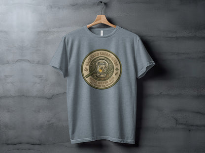 Backyard Safari Guide Explorer: Backcountry Outpost Shirt: Circular graphic with magnifying glass, jar, and text: Hose Water Gin.