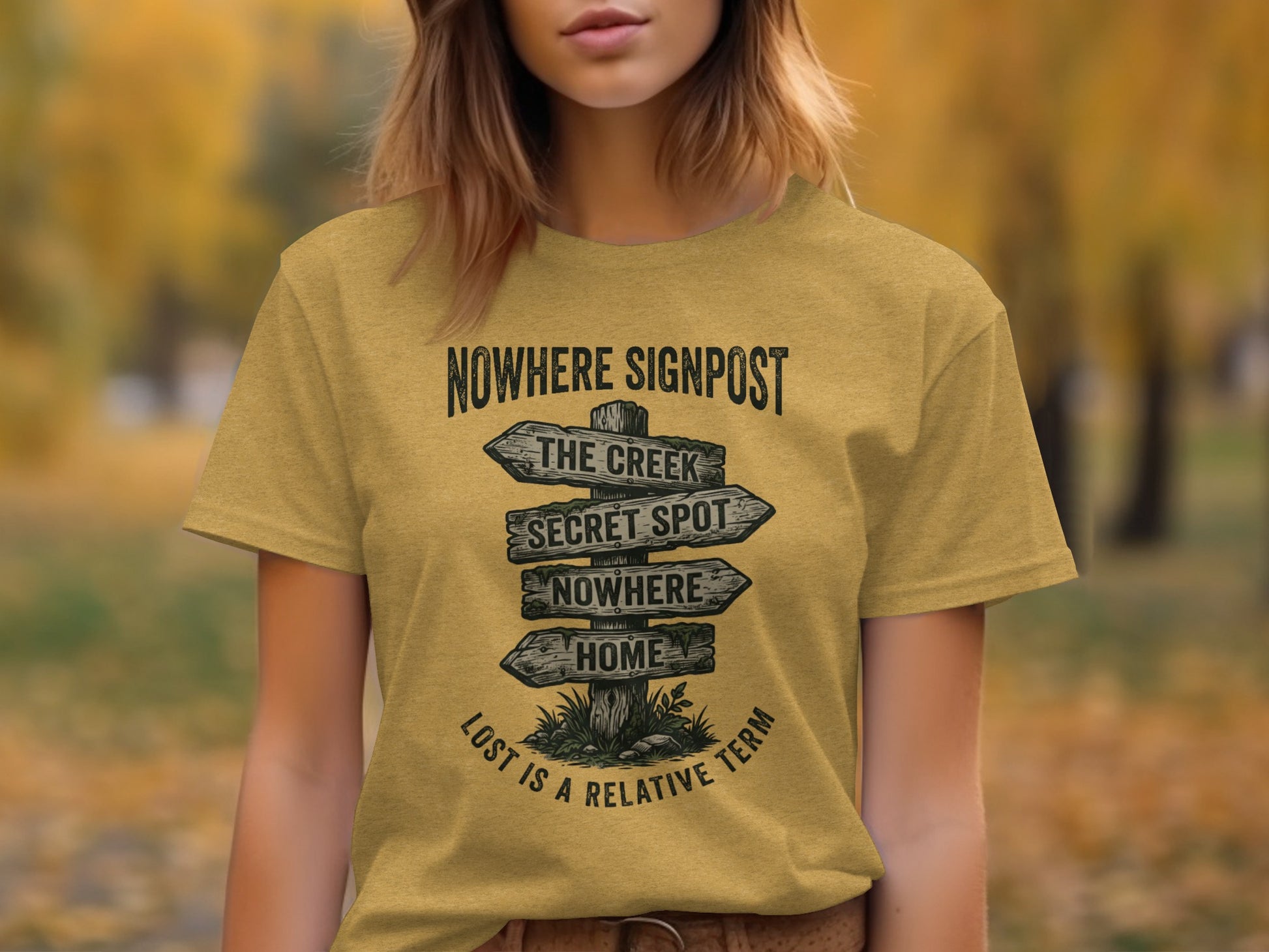Nowhere Signpost Adventure: Backcountry Outpost Shirt: Yellow t-shirt with a distressed signpost reading "Nowhere," "The Creek," "Secret Spot," and "Home."
