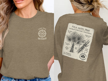 Brown t-shirt with "Take the Detour" logo on front and nature illustration on back.