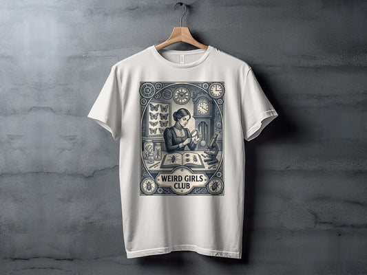 White t-shirt featuring a circular graphic of a woman examining specimens under a magnifying glass.