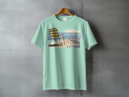 T-shirt with a beach chair on a pier at sunset graphic.