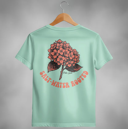 Mint t-shirt with coral hydrangea graphic and "Salt-Water Rooted" text.